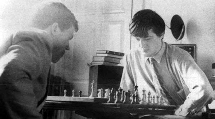 Hugh Lauri and Stephen Fry playing chess in Fry's rooms at Cambridge, 1980.